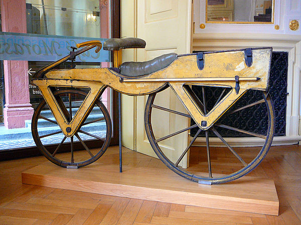 antique wooden bicycle with iron wheels